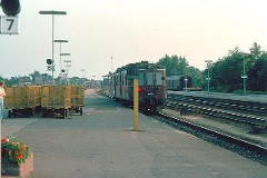 DSB MO 1849 heading for Vojens photographed at the railway station in Fredericia July 1975.  The MO class (type V) was built by Frichs in Denmark in a number of 90. It was put in service in 1951 - 1958. 3-B. Two 6-cyl. Frichs dieselelectric engines. 500 hp. Max speed 120 km/h - 75 mph. Length 20 930 mm. Weight 65 metric tonnes. 37 seats. MO 1849 was put in service in 1954. Withdrawn from service in 1983.